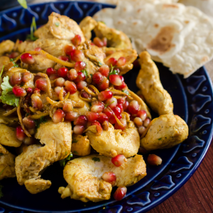 Pollo al curry con granada fresca y especias